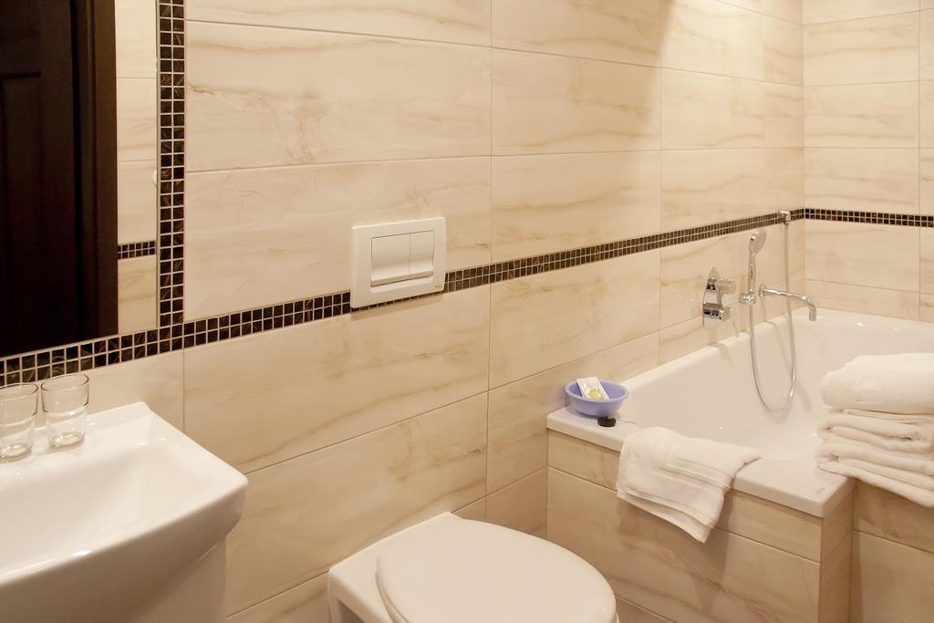 Apartamenty Hotelu Pod Orlem ทอรูน ภายนอก รูปภาพ