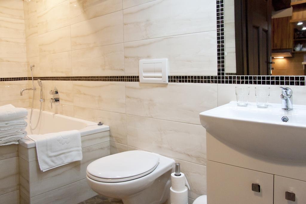 Apartamenty Hotelu Pod Orlem ทอรูน ภายนอก รูปภาพ